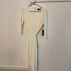 Midi, long sleeved dress with open back and button details